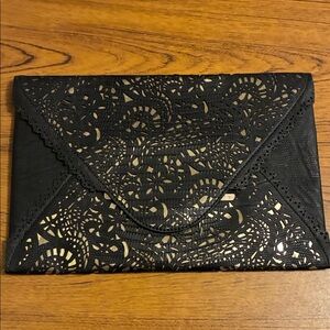 BCBGMaxAzria Black Clutch with Gold Accent